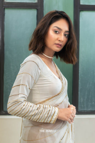 Aura white Hand-embroidered blouse Aura white Hand-embroidered blouse