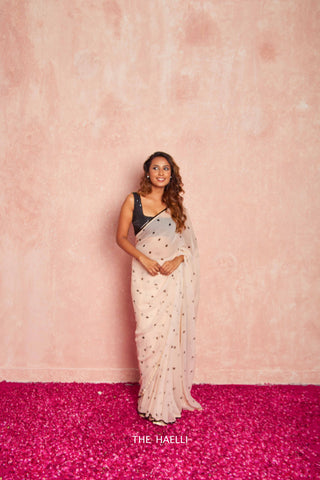 Zareen beige chiffon saree Zareen beige chiffon saree