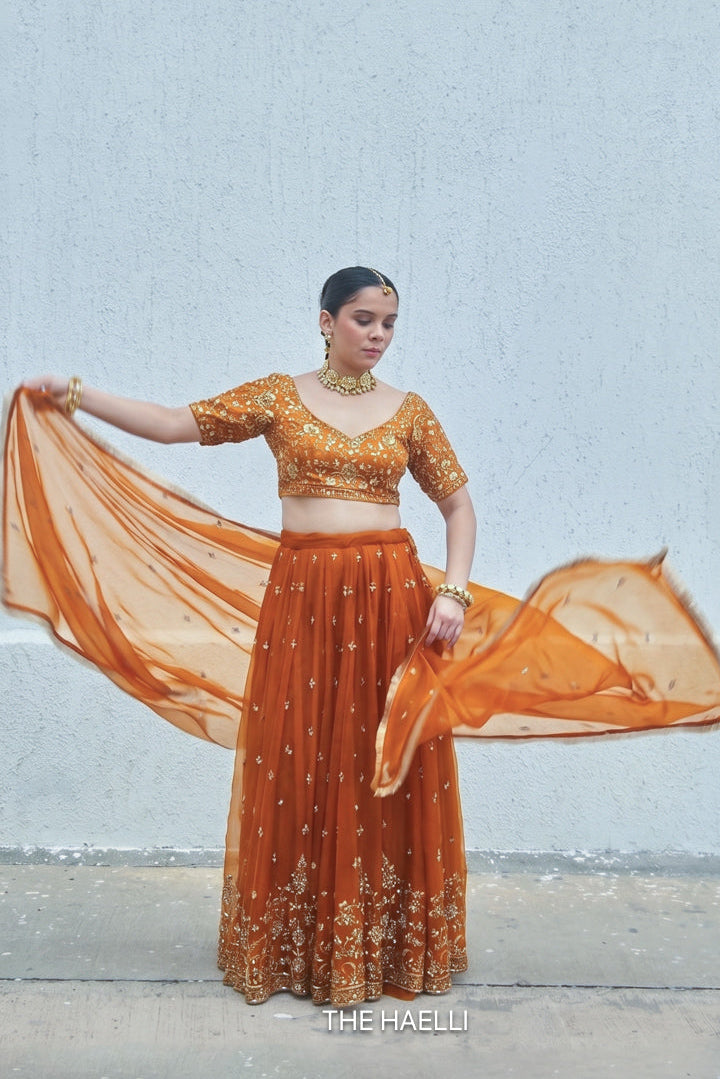 Lekha Orange Organza Silk Lehenga